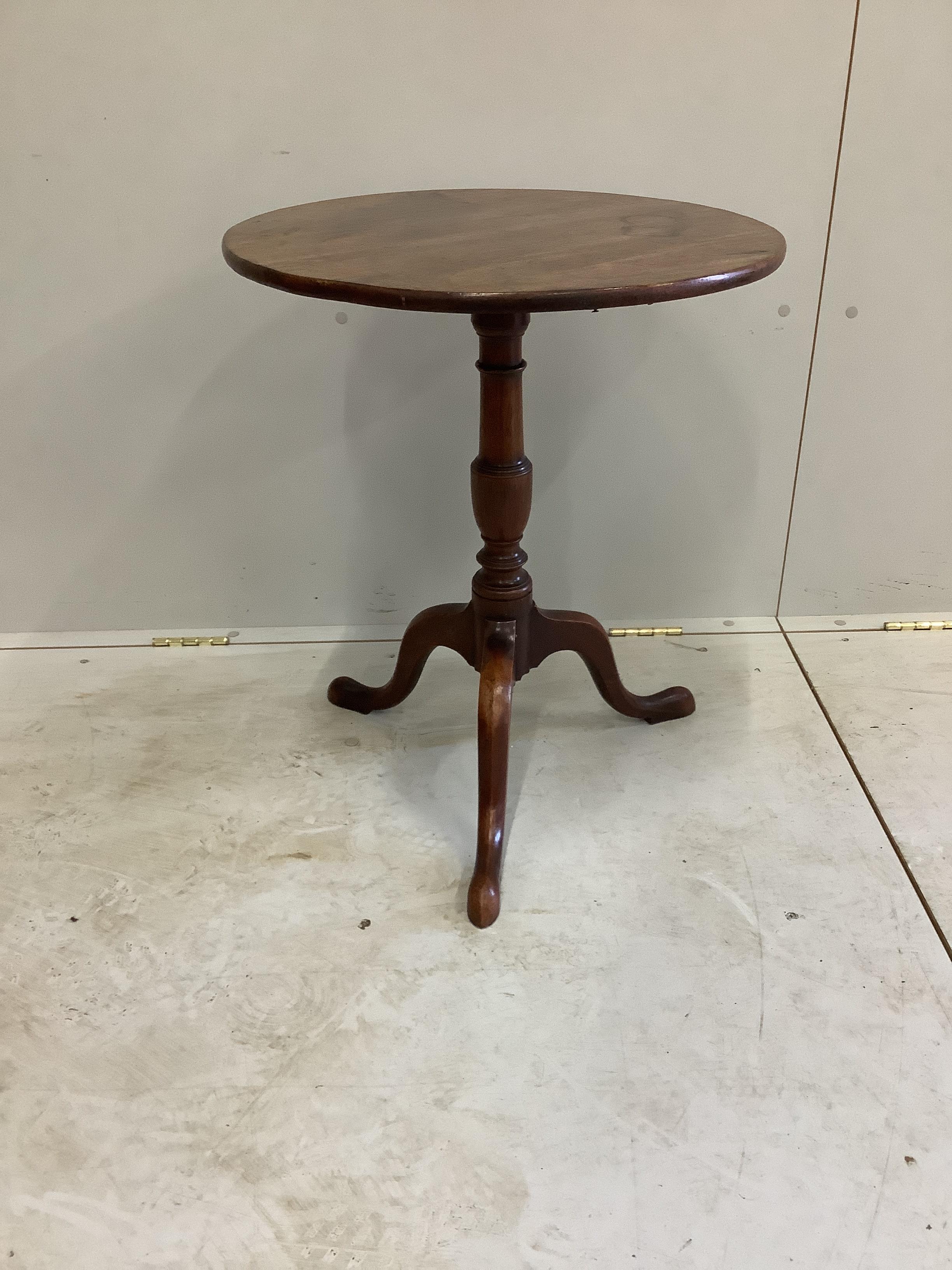 A George III circular mahogany tripod wine table, diameter 52cm, height 63cm